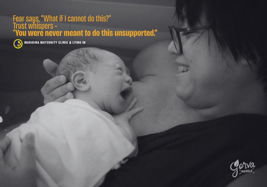 A parent sharing a quiet moment with their newborn