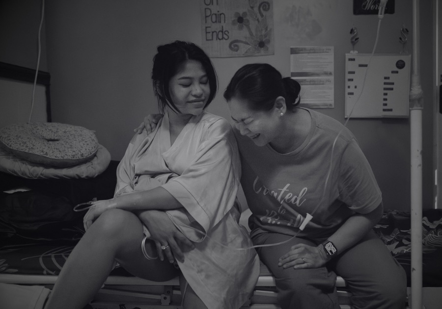A mother and birth worker sharing an encouraging moment