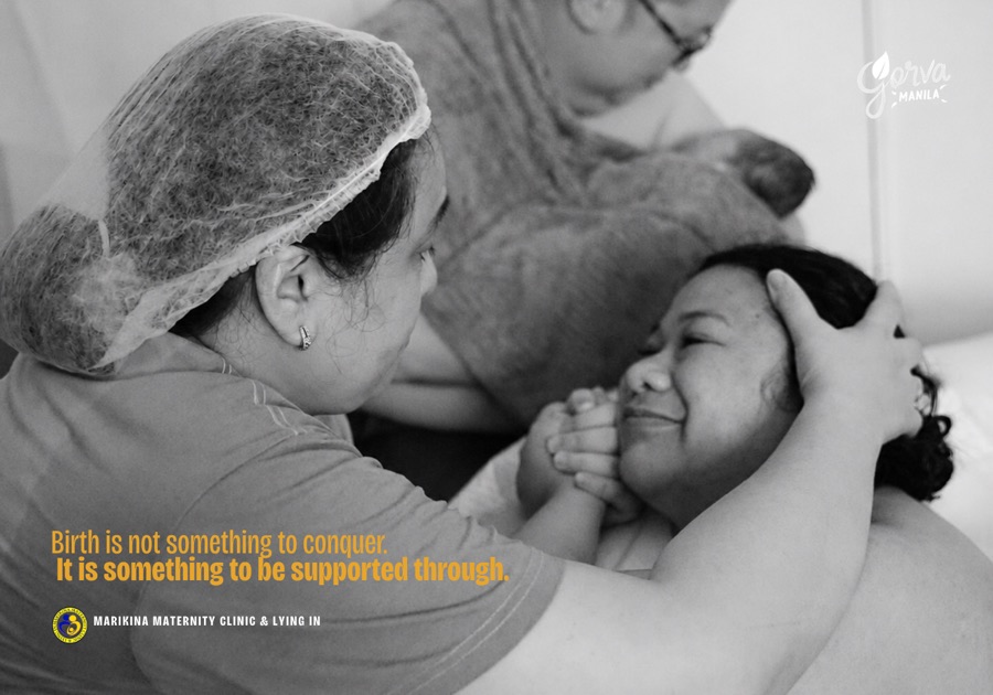 A birth worker reassuring a mother during labor