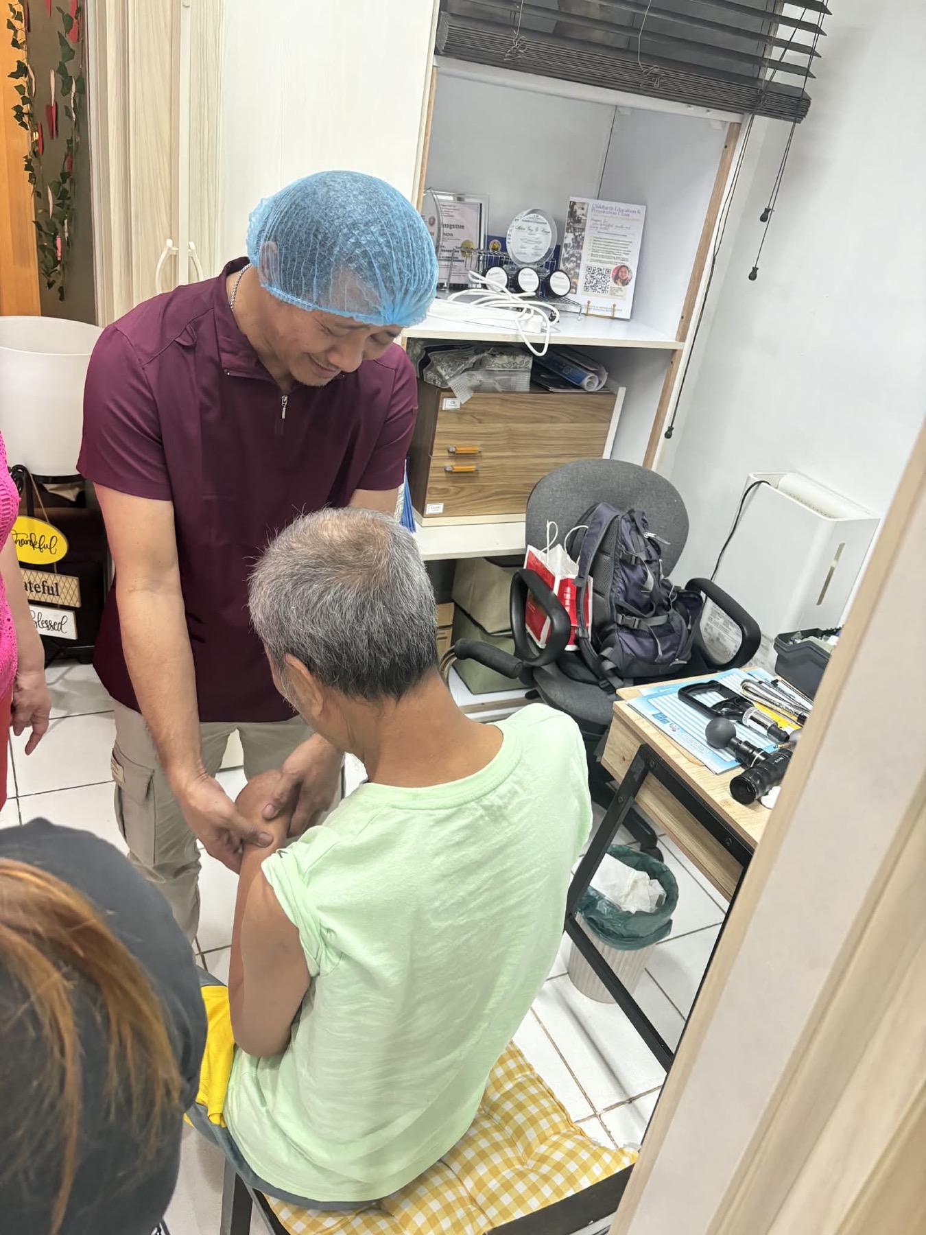Provider assisting a client during a wellness session