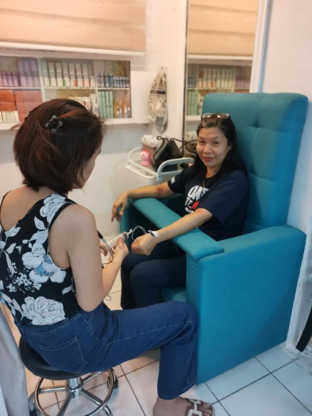 Adult client receiving supervised IMI support